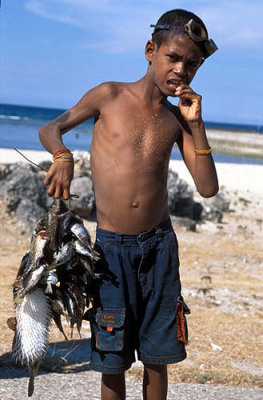 Young fisherman at Com