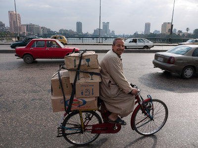 Happy Egyptian on a bicycle