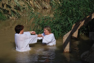 People purchased baptism cloths in the shops at the site and dipped each other.