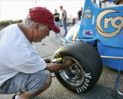 Bob Santos checks tire pressure