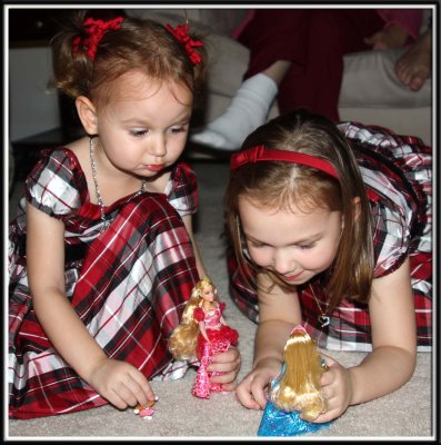 Kylie and Noelle get little Barbie dolls from Aunt Patti