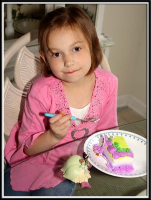 Noelle eats her yummy cake (actually she just ate all the frosting off)