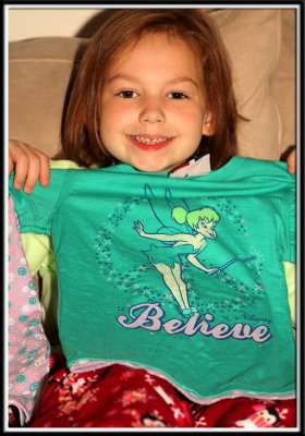 Noelle gets a tinkerbell shirt from Kylie