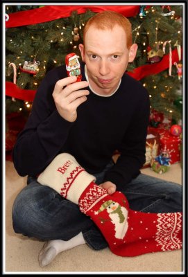 Brett opens his stocking stuffers