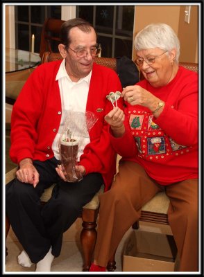 Pepere gets a chocolate boot with money folded into lollipops!