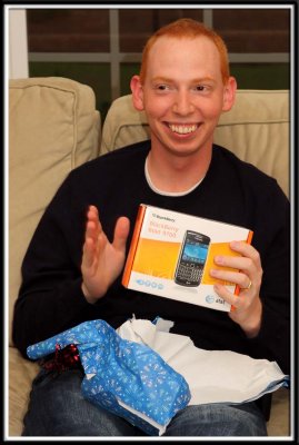 Brett gets his new Blackberry! He is one happy man.