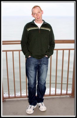 Brett on the balcony... We were on the 20th floor! (which is funny, because both of us are afraid of heights! LOL)