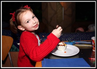 Noelle loves her ice cream sundae at Coral Reef