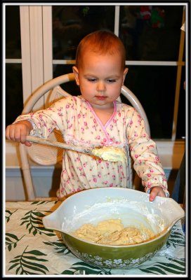 Kylie mixes the cookie batter