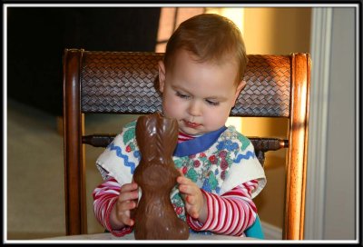 Kylie pets her bunny and wishes it happy trails into her belly