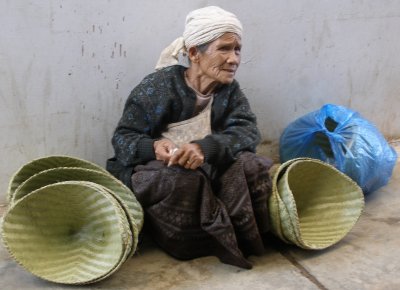 Hmong woman selling baskets, Talat Sao