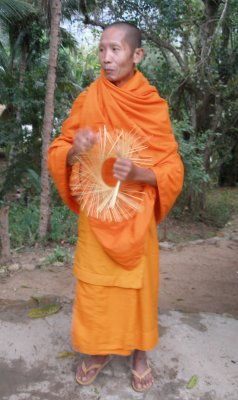 Buddhist monk weaving