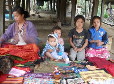 One of many family-run stalls selling textiles