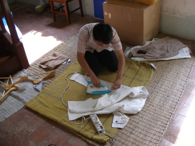 Ironing Lao style inside a fashion house