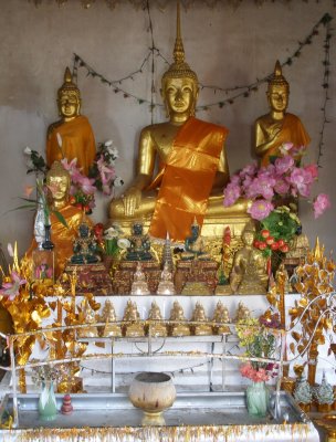 Buddhist shrine inside temple on Phou Si