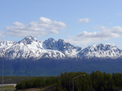 Pioneer Peak, West Twin Peak, and Mount POW/MIA (the flat topped one), currently the largest natural monument in the world.