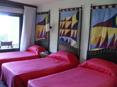 Endless beds in the room - Lake Manyara Serena