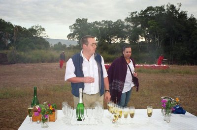 Champagne after a successful flight, with the pilot of the other balloon