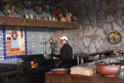 This outdoor kitchen is one of three large kitchens (also used for cooking classes).