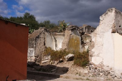 Next to the church there are crumbling ruins...