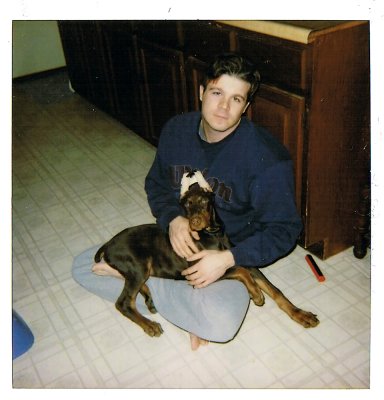 Scan from an old polaroid of me and my boy