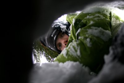 Traveling through our snow tunnel in the back yard