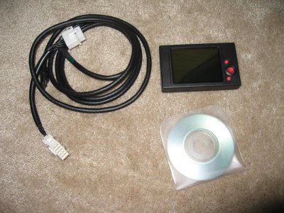 The LCD unit comes with a harness to connect to the Power Commander and a software disc that has the instructions