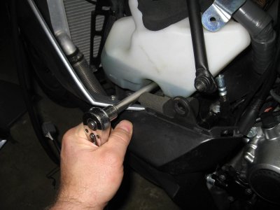 Removing bottom bolt on coolant tank