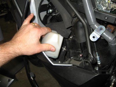 Push the coolant reservoir out of your way