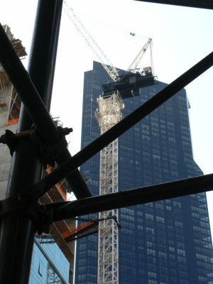 W 57th Construction: scaffold in foreground, crane in background
