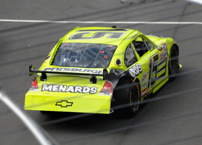 PAUL MENARD HEADS FOR THE PITS AFTER SUSTAINING CRASH DAMAGE