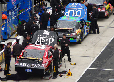 CREWS FOR MATT KENSETH (#17) AND J.J. YELEY (#96) MAKE SOME PRE-RACE ADJUSTMENTS ON THEIR CARS