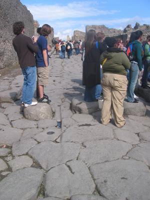 Chariot Ruts visible in Street - Students on Stepping Stones