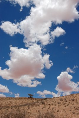 Clouds reflecting colour of sand dunes