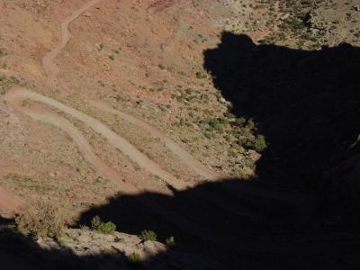 Switchbacks of Shafer Trail,marked as a Unpaved 4 wheel drive road .But used by MTN bikers .