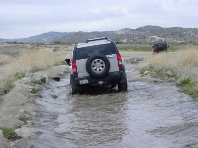  Scott trying to clean off dirt while in this water, off trailer hitch he's been draging