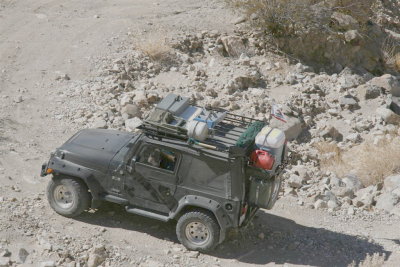 George looks like he's got the kitchen sink on top of his jeep.