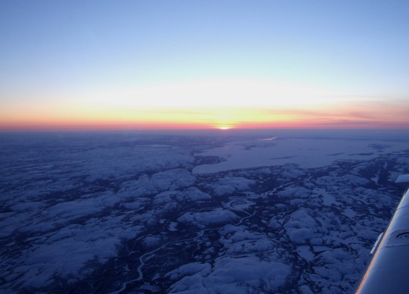 Oops - night flying over frozen tundra