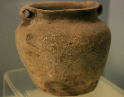 Charcoal mixed black pottery jar with two ears