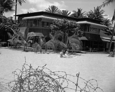 Barbed wire and sun bathers