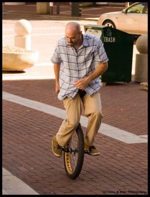 Unicycle on the circle