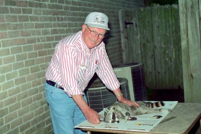 1996 - Ginny's Dad Skins a Road Kill Coon for Robert