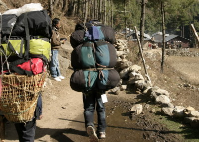 Porters with full loads.