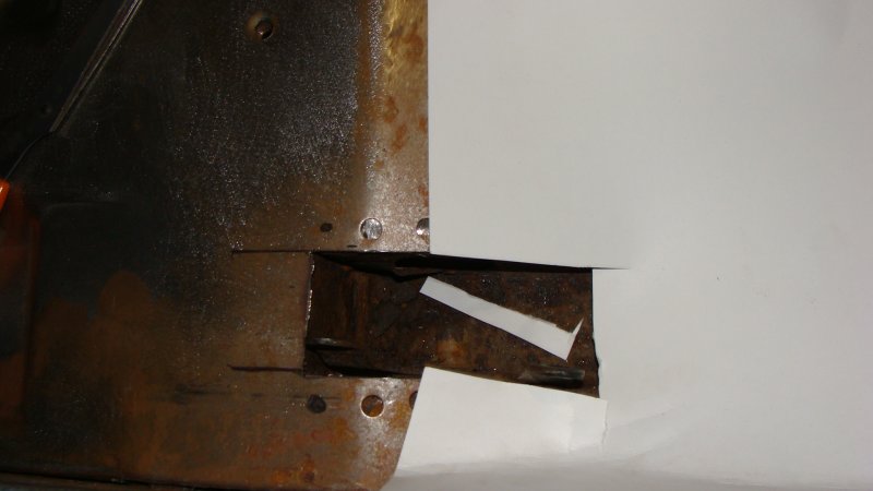 Making a template for the left rear floor pan out of poster board