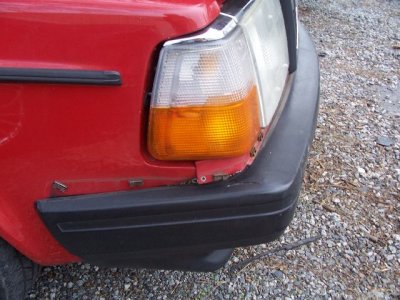 Right front bumper tree impact damage