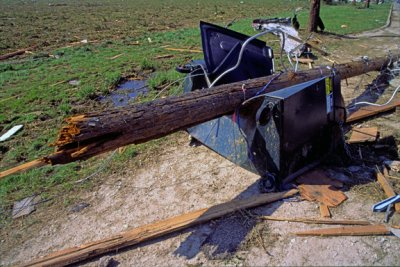 (METE76) Dumpster wrapped around a telephone pole, Plainfield F5 tornado, Plainfield, IL