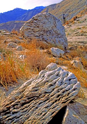 (AR13) Pitting in granite caused by wind blown sand, San Gorgonio Pass, CA
