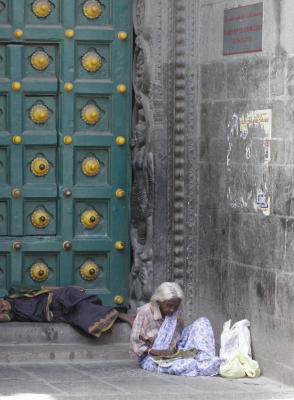 beggars at the doors of the temple