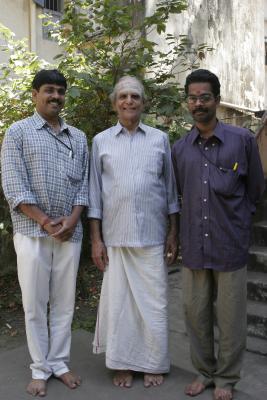 my mridangam teacher, Sivaraman (center)