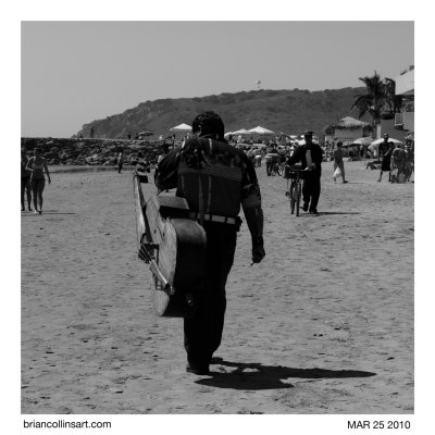 Mariachi player on the beach